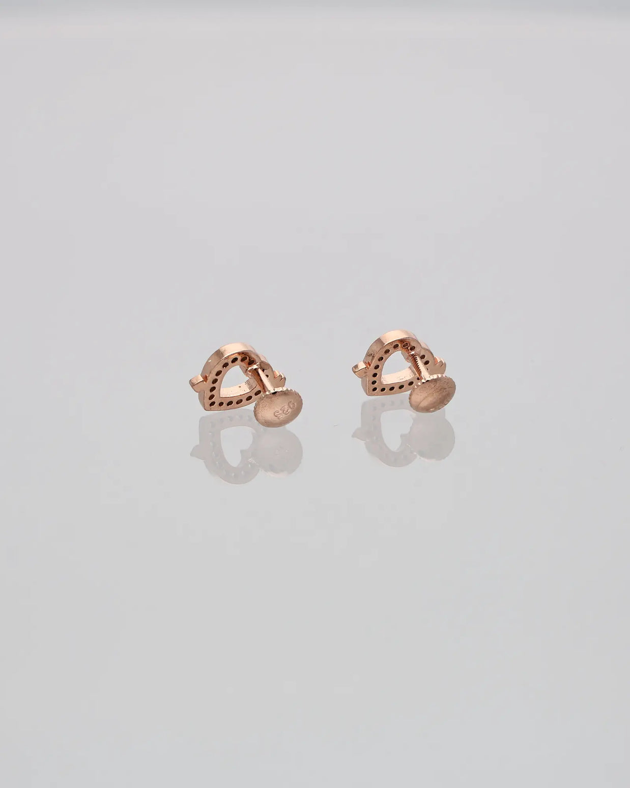 Heartfelt Arrow Studs: Love in Gold