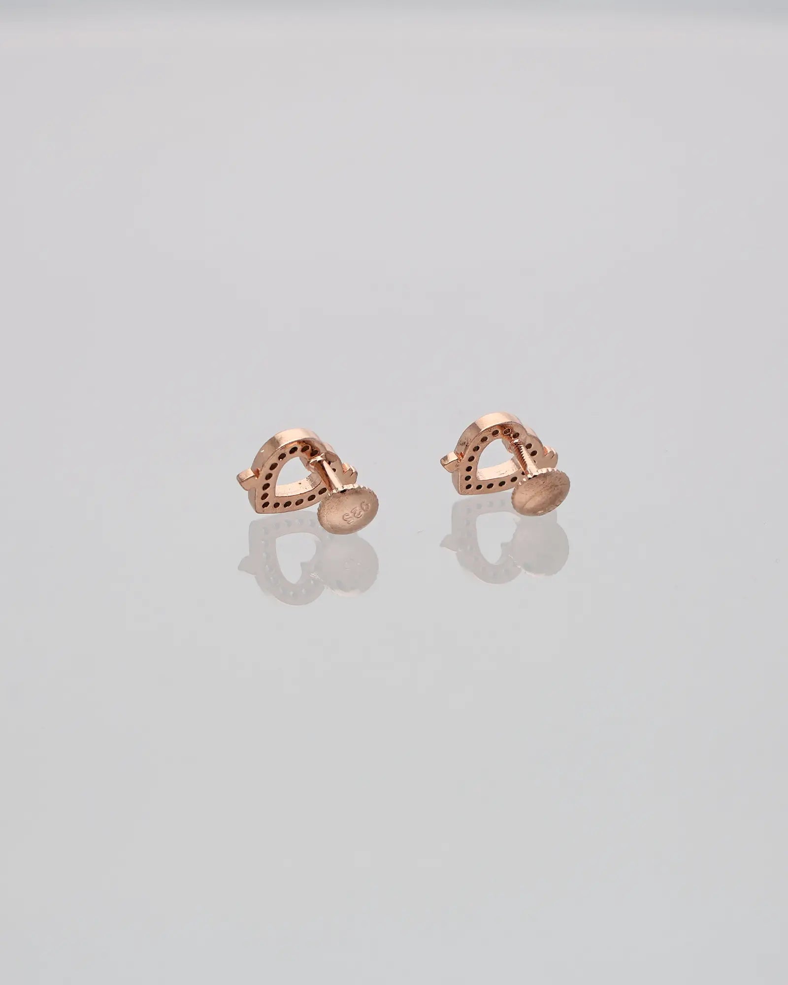 Heartfelt Arrow Studs: Love in Gold