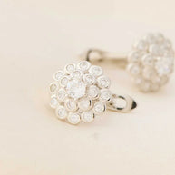 Floral J Rhodium Studs in 92.5 Silver